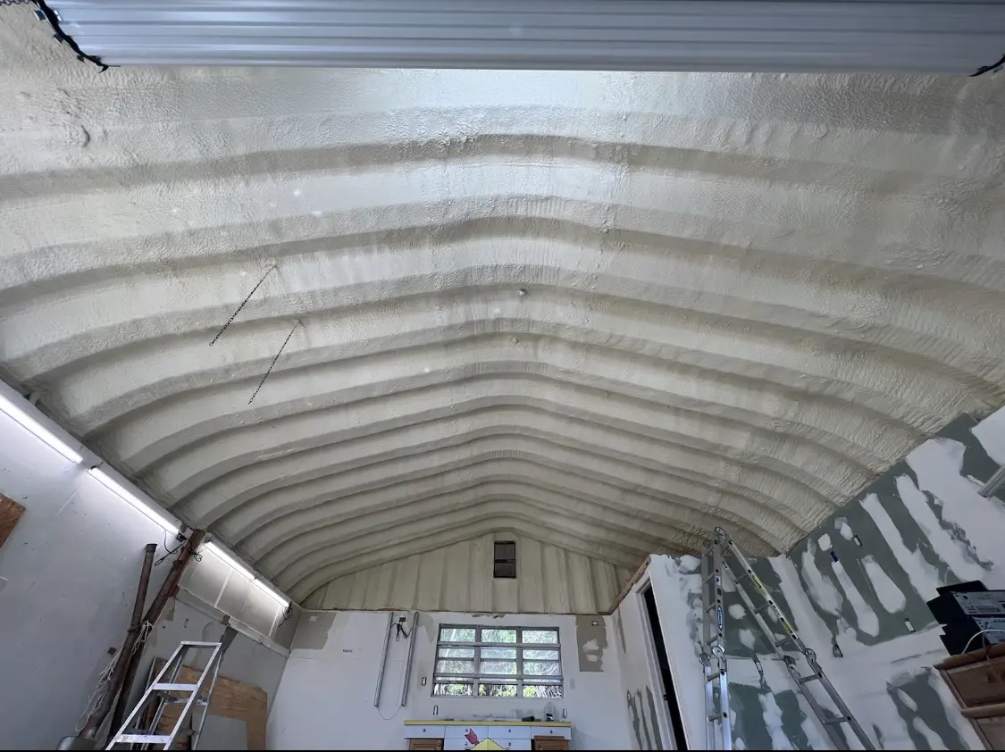 Spray polyurethane foam applied to the underside of a metal roof deck in Prairie du Chien